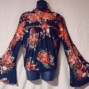 Free People Bainbridge cold shoulder embroidered top.